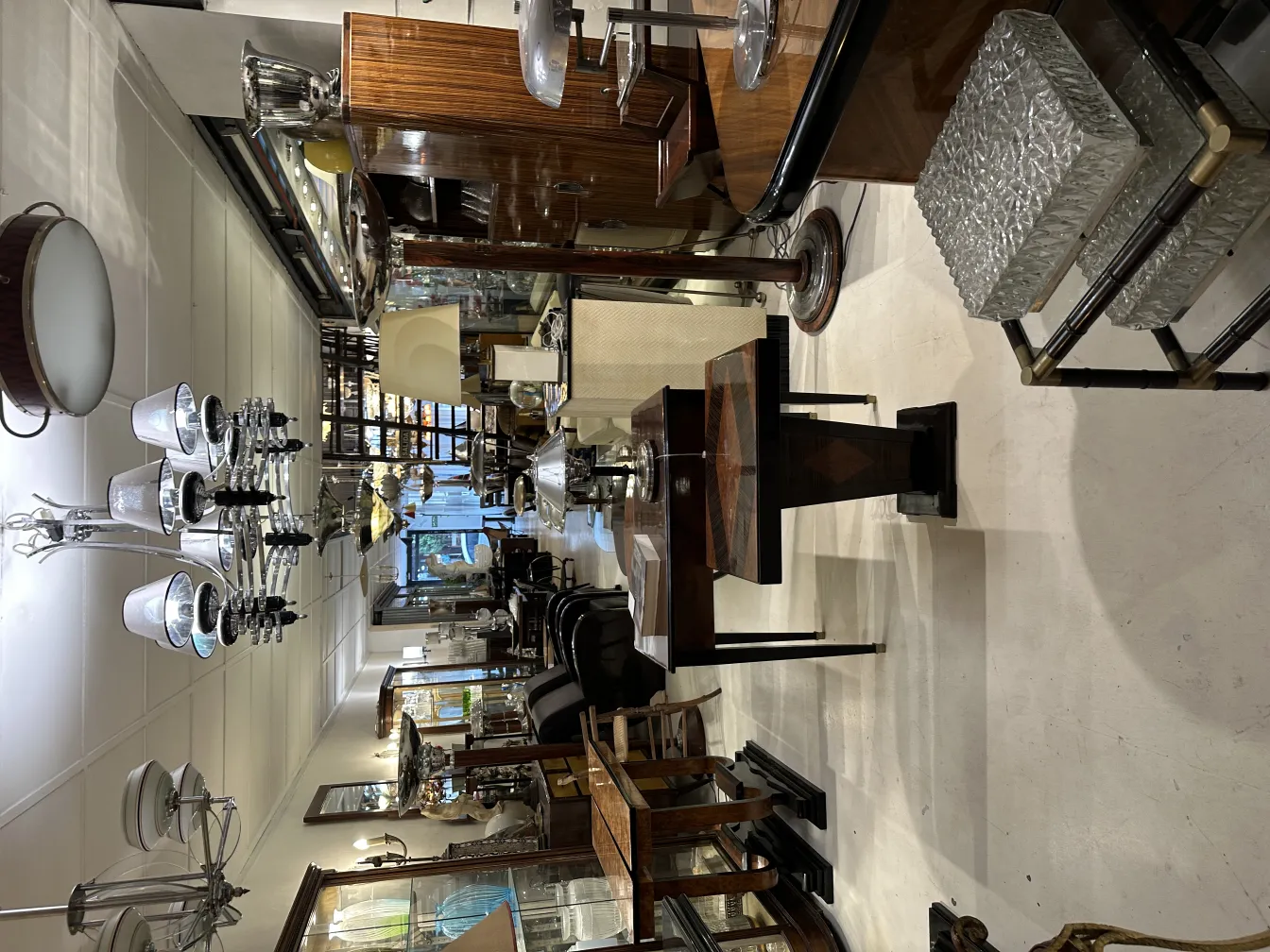 Antique hanging lamp with classic appearance in an elegant and well-lit environment.