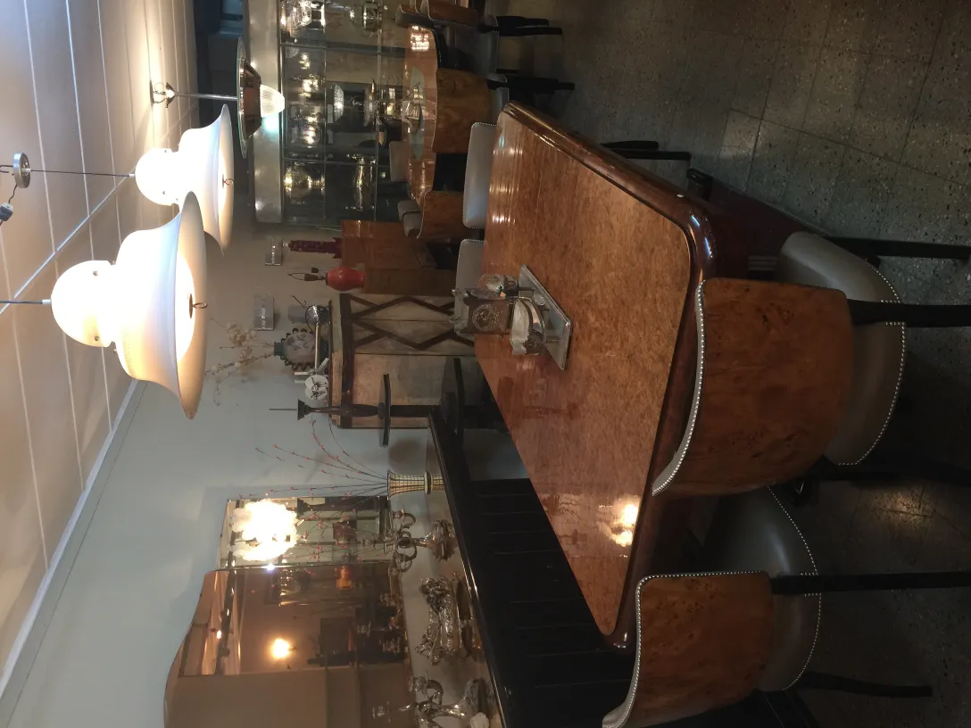 Two antique hanging lamps with an elegant shape in a cozy setting.