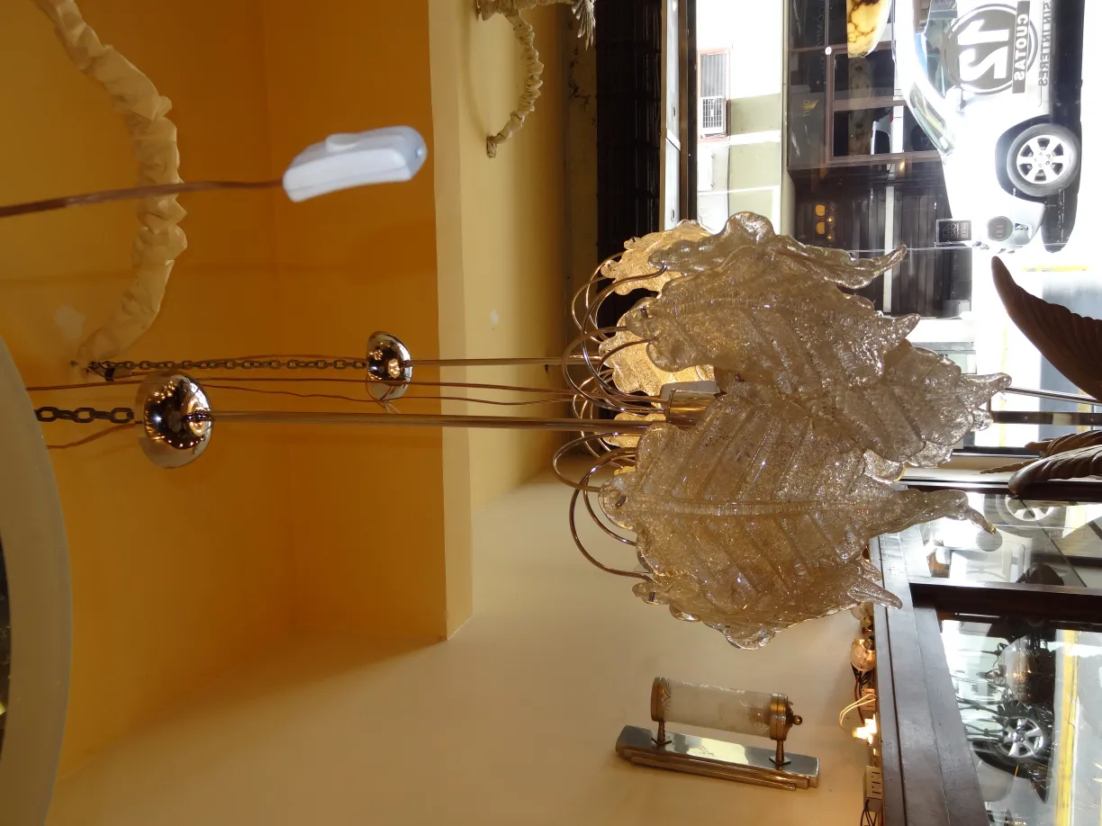 two antique hanging lamps with an elegant design in a cozy setting