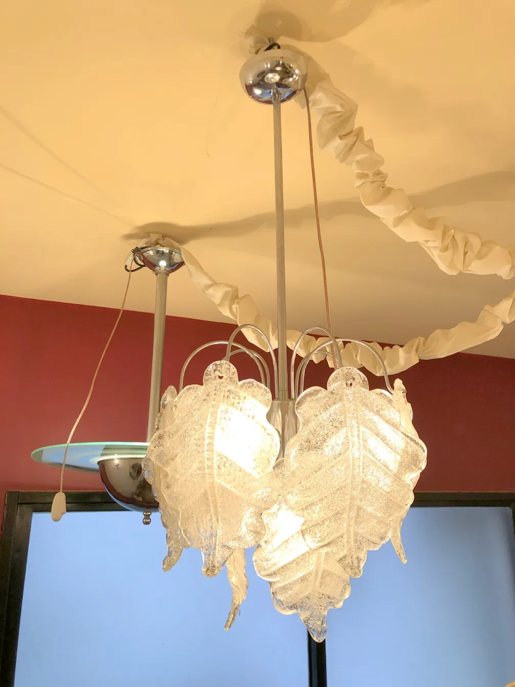 two antique hanging lamps with visible decorative details