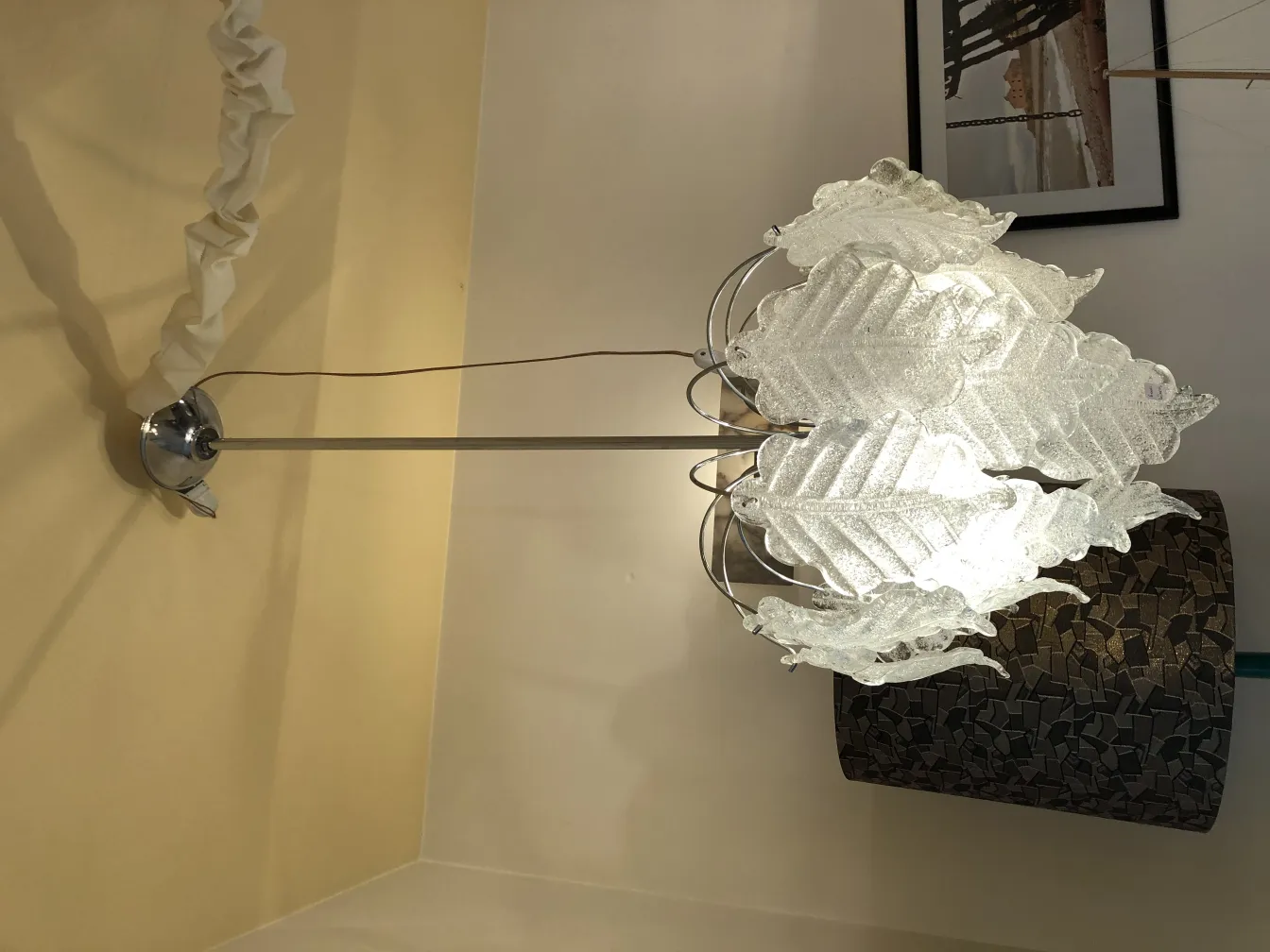 two antique hanging lamps with leaf design illuminating a cozy atmosphere