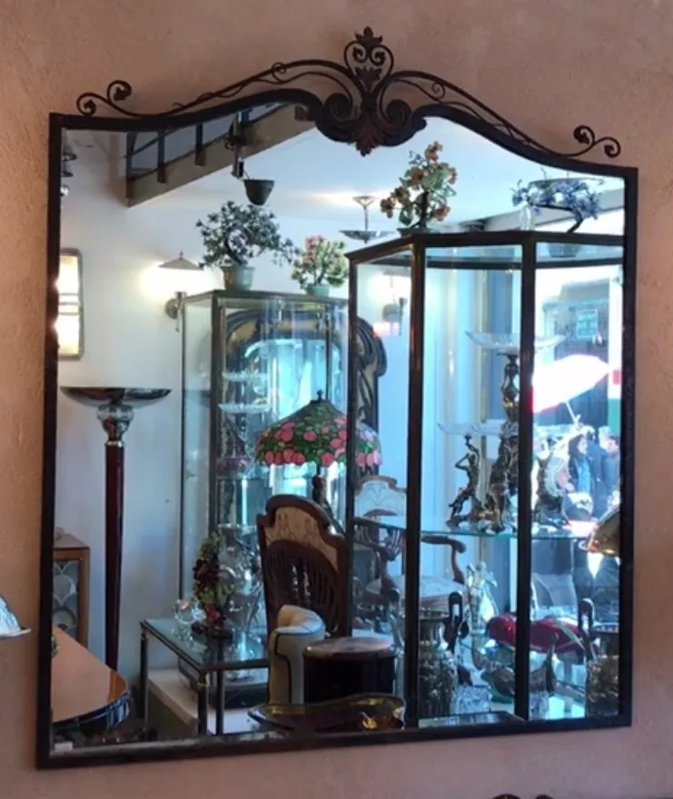 antique mirror with decorative design in an elegant setting