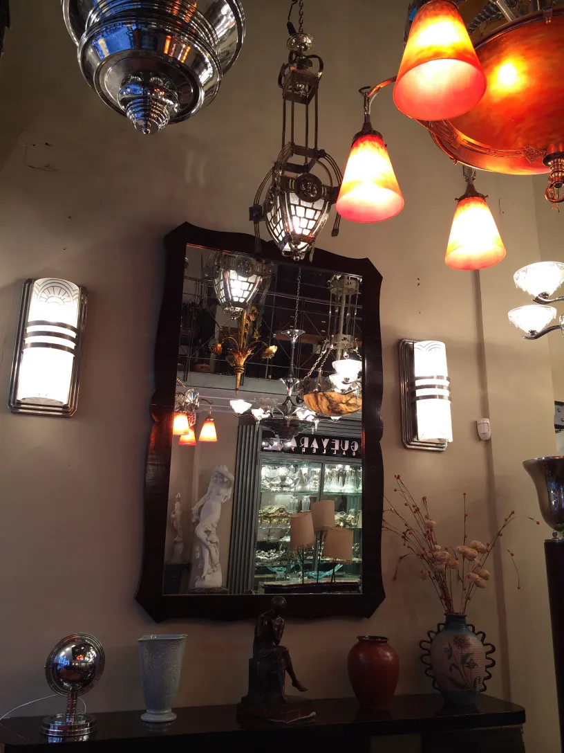 antique decorative mirror in an elegant setting with lights