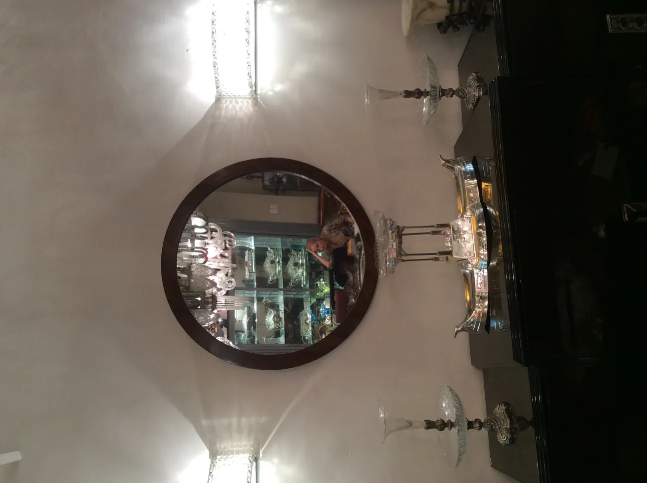 antique round mirror with decorative frame