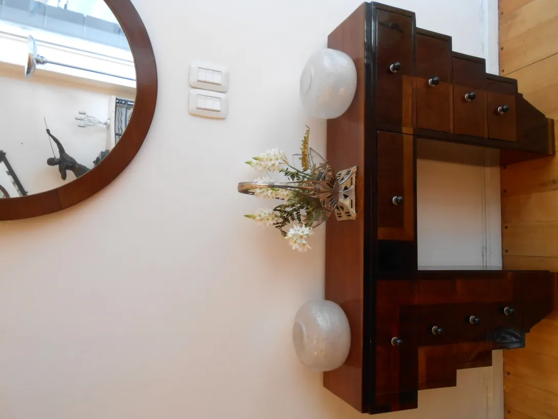 miroir rond décoratif ancien avec vase