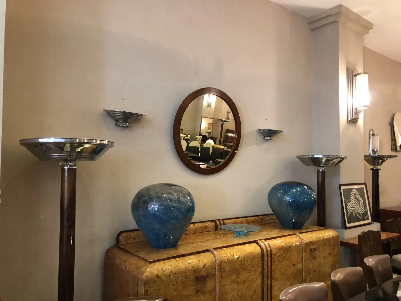 antique round mirror with classic frame in a decorative room