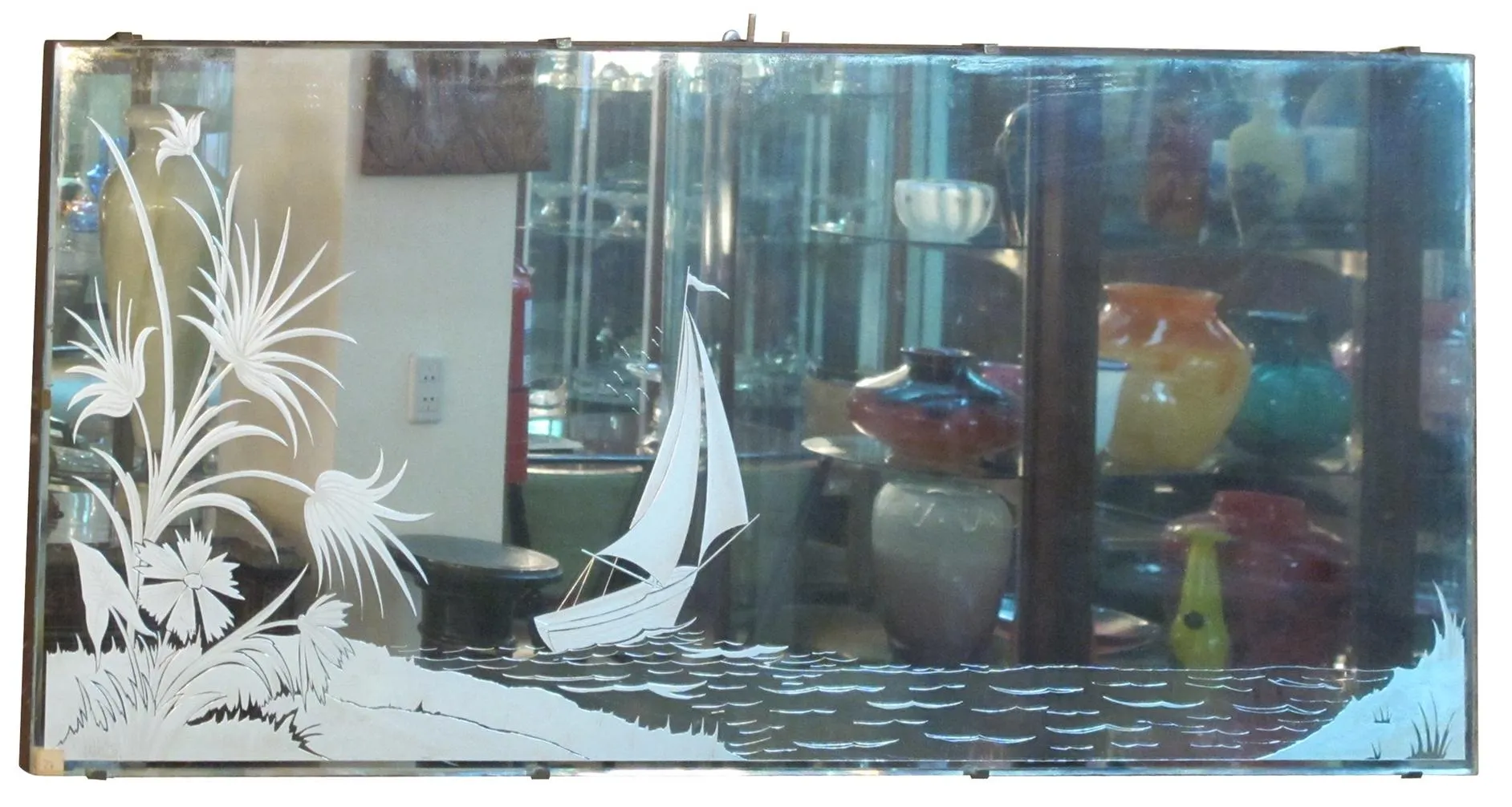 Miroir antique avec gravure décorative de bateau et plantes