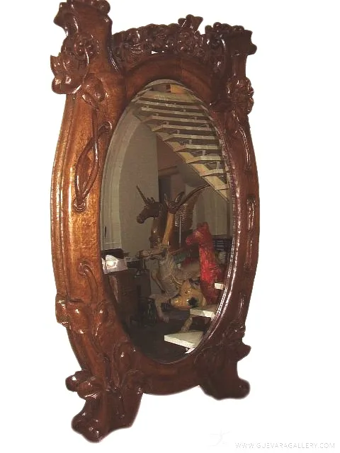 Espelho antigo decorativo com moldura floral