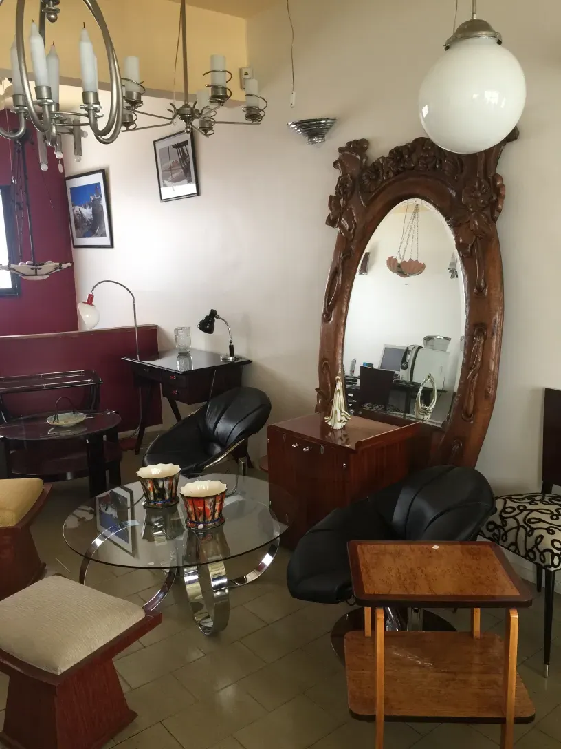 decorative antique mirror in a cozy room with furniture