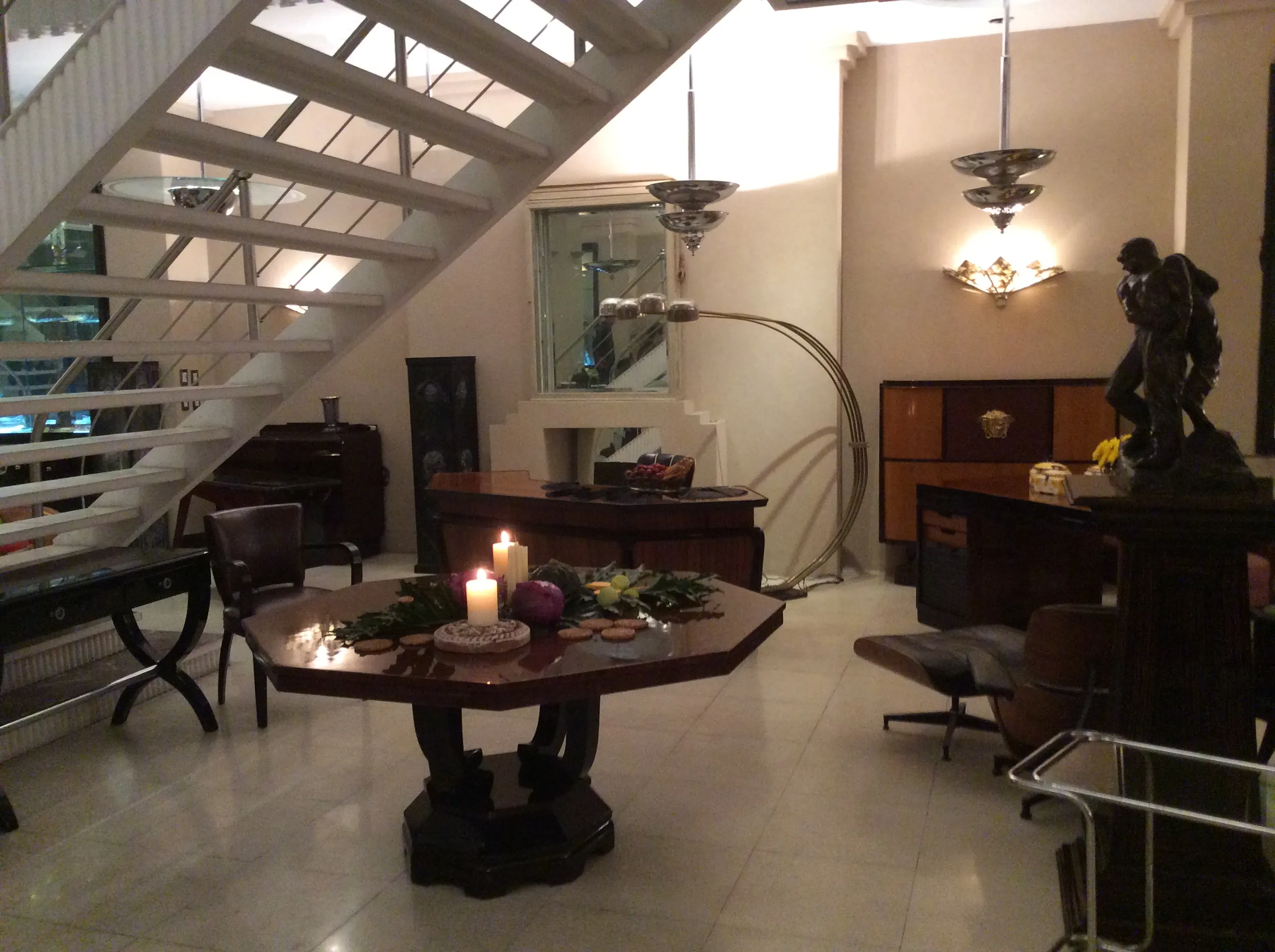 antique dining table for eight people in a modern setting, soft lighting, elegant decor.