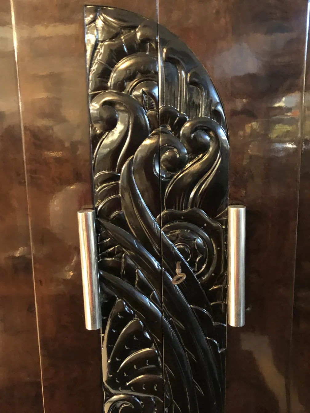 ornamental details on an antique bookcase