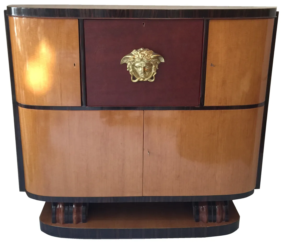 antique bookcase with a distinctive design and a golden face, perfect for classics