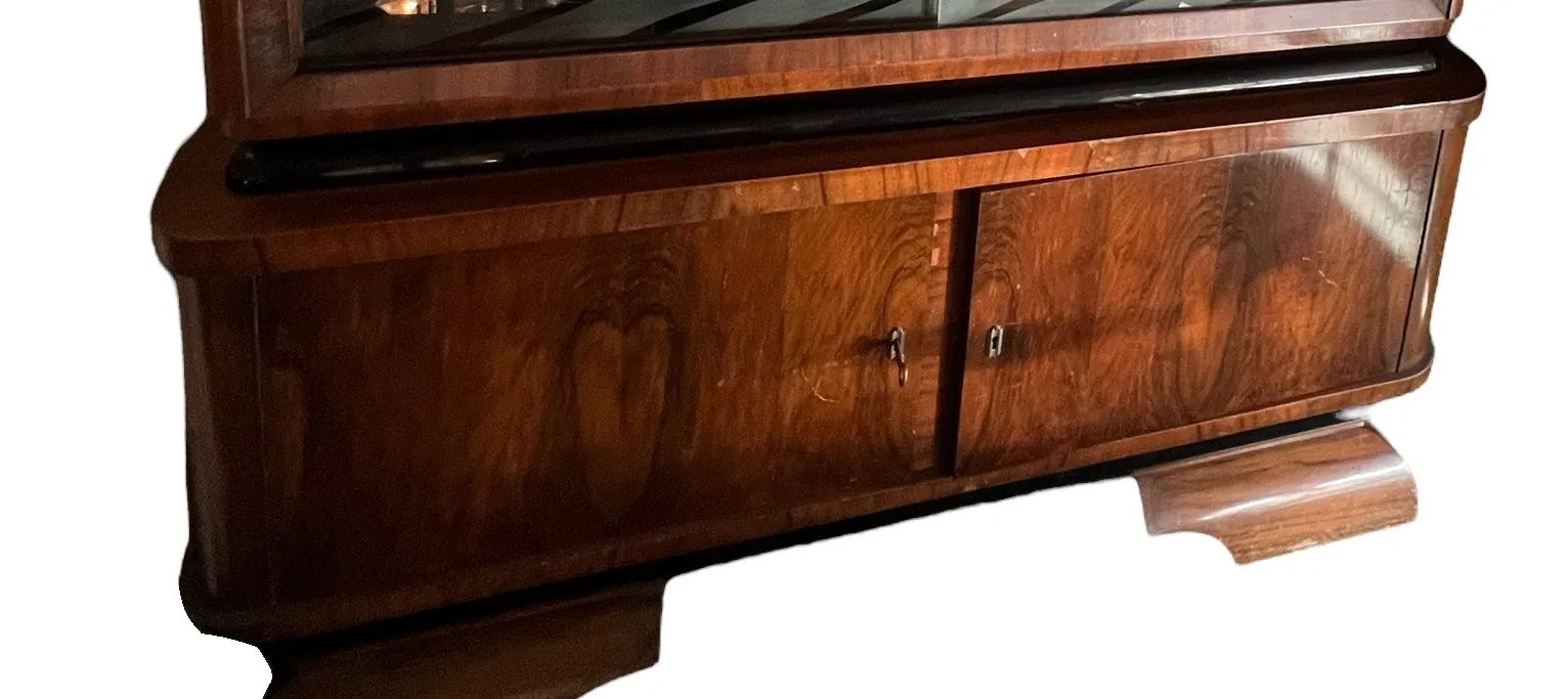 antique bookcase with elegant details and doors