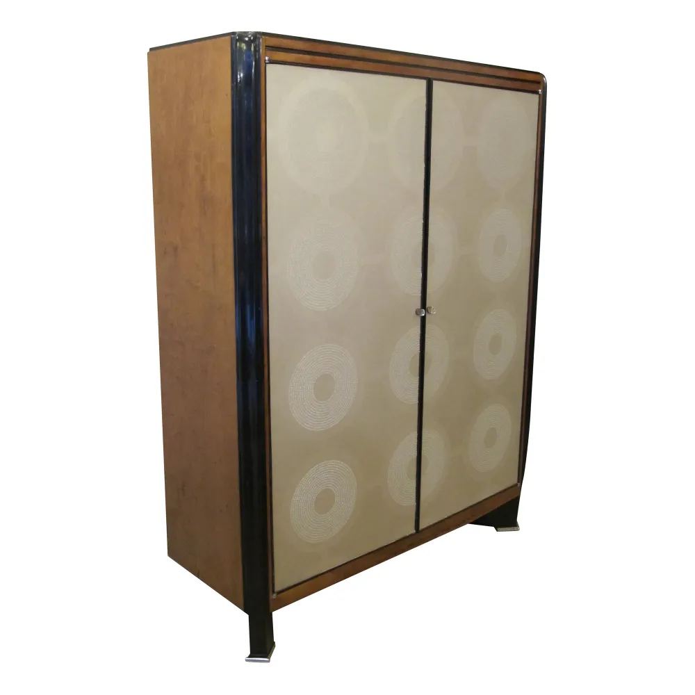 antique bookcase with decorative doors and distinctive style