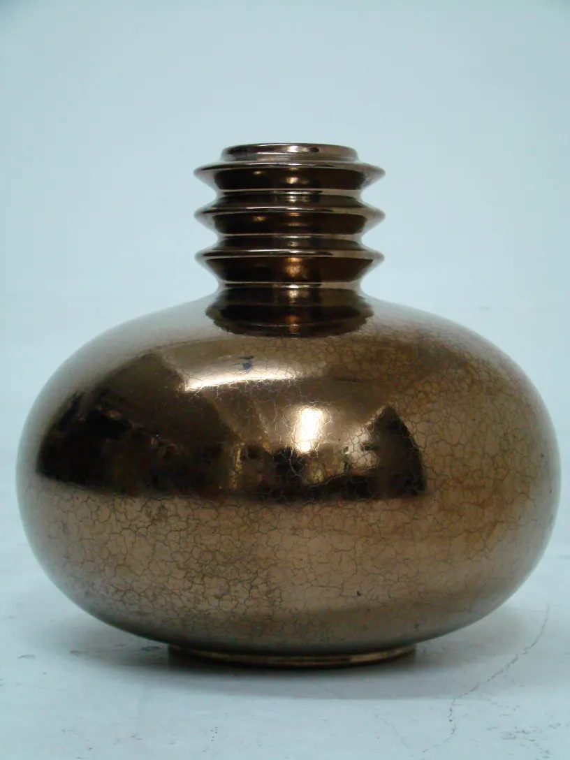 antique ceramic vase with brown tones and crackle texture