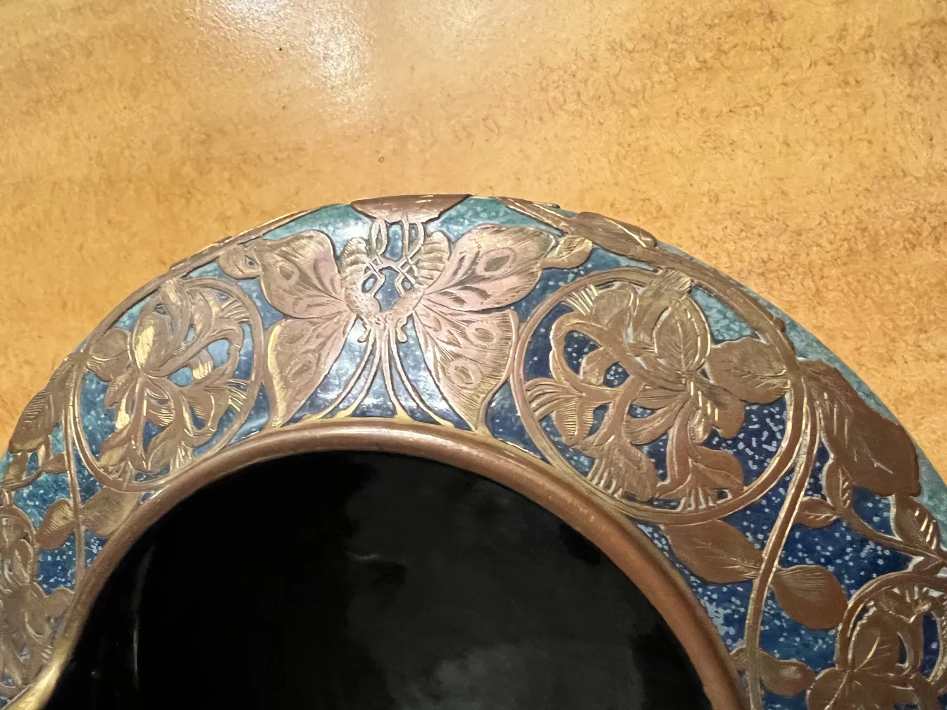 Antique ceramic with floral decoration in blue tones