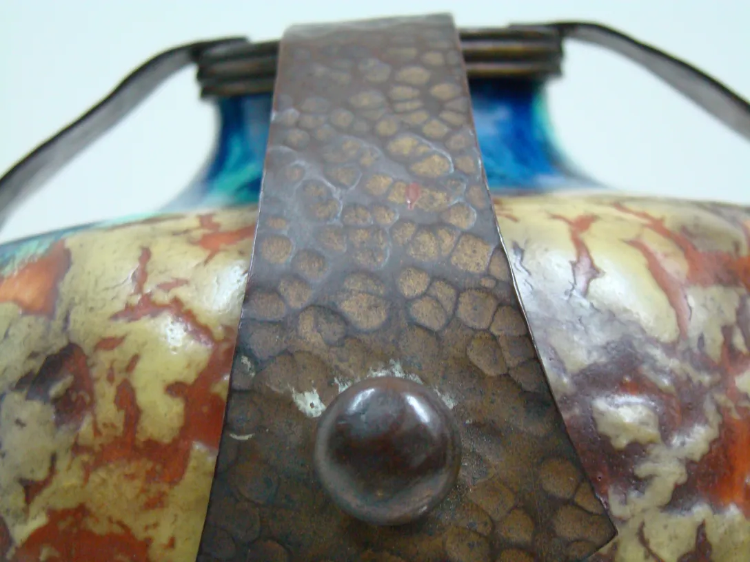 Detailed view of an antique ceramic with vibrant colors and texture