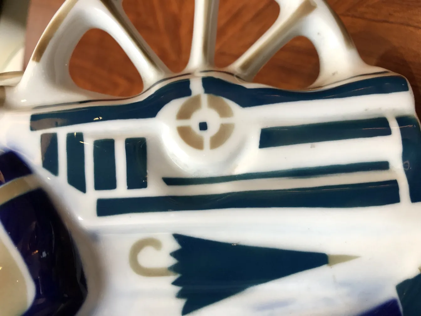 antique ceramic with blue and white shapes, elegant design