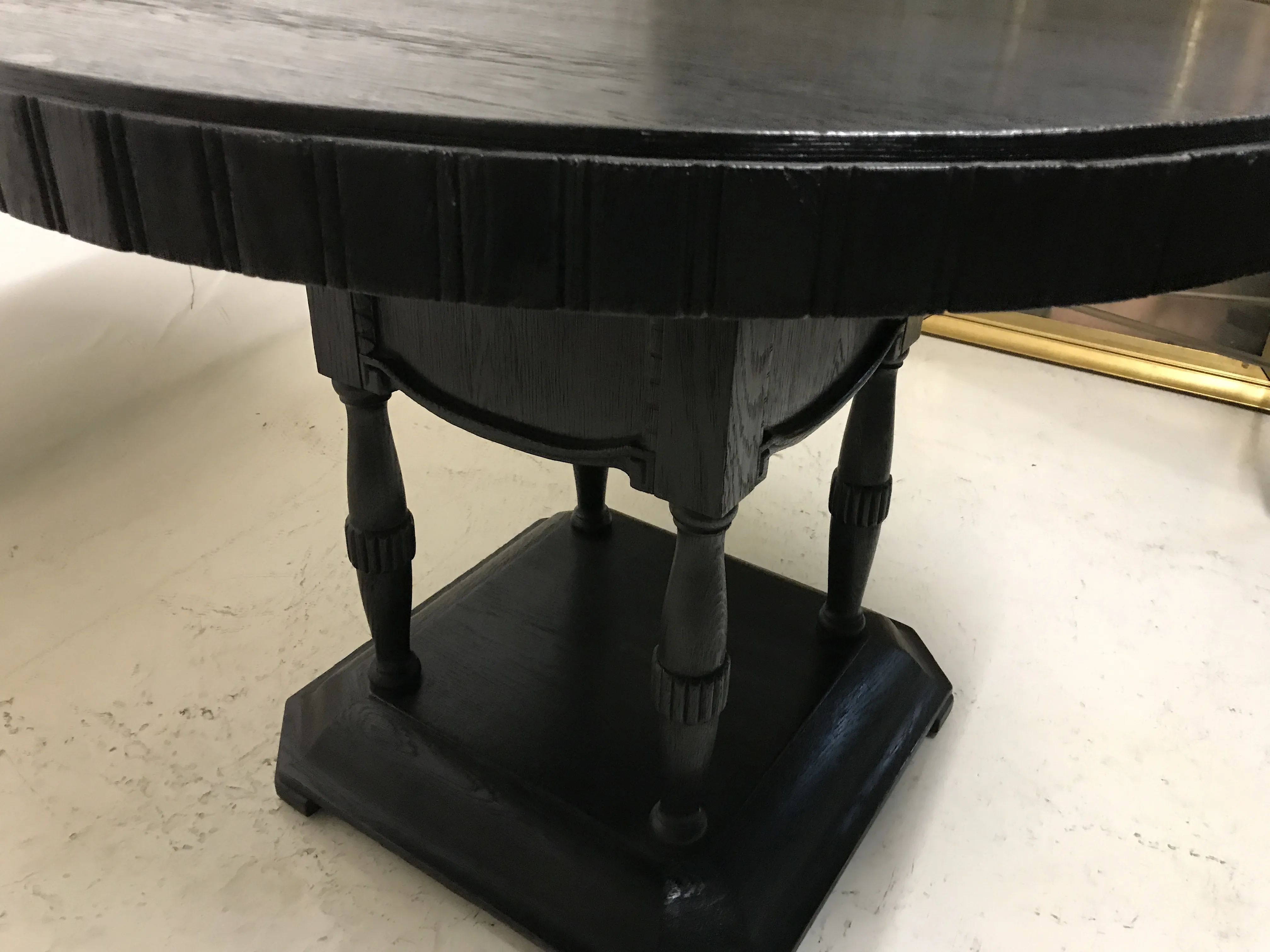 antique table with square base, turned legs, elegant setting