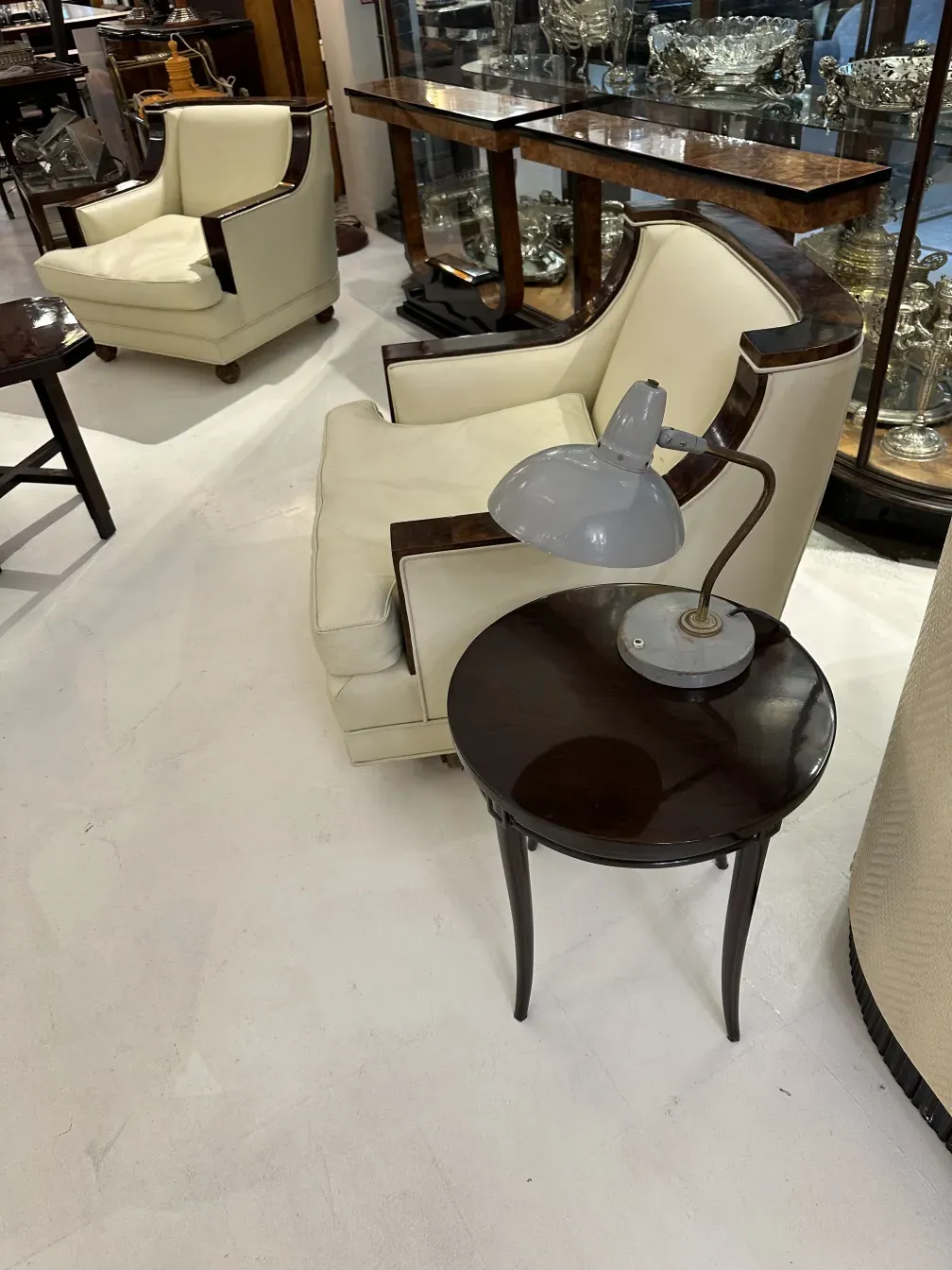 antique table lamp by Serge Mouille in a stylish setting