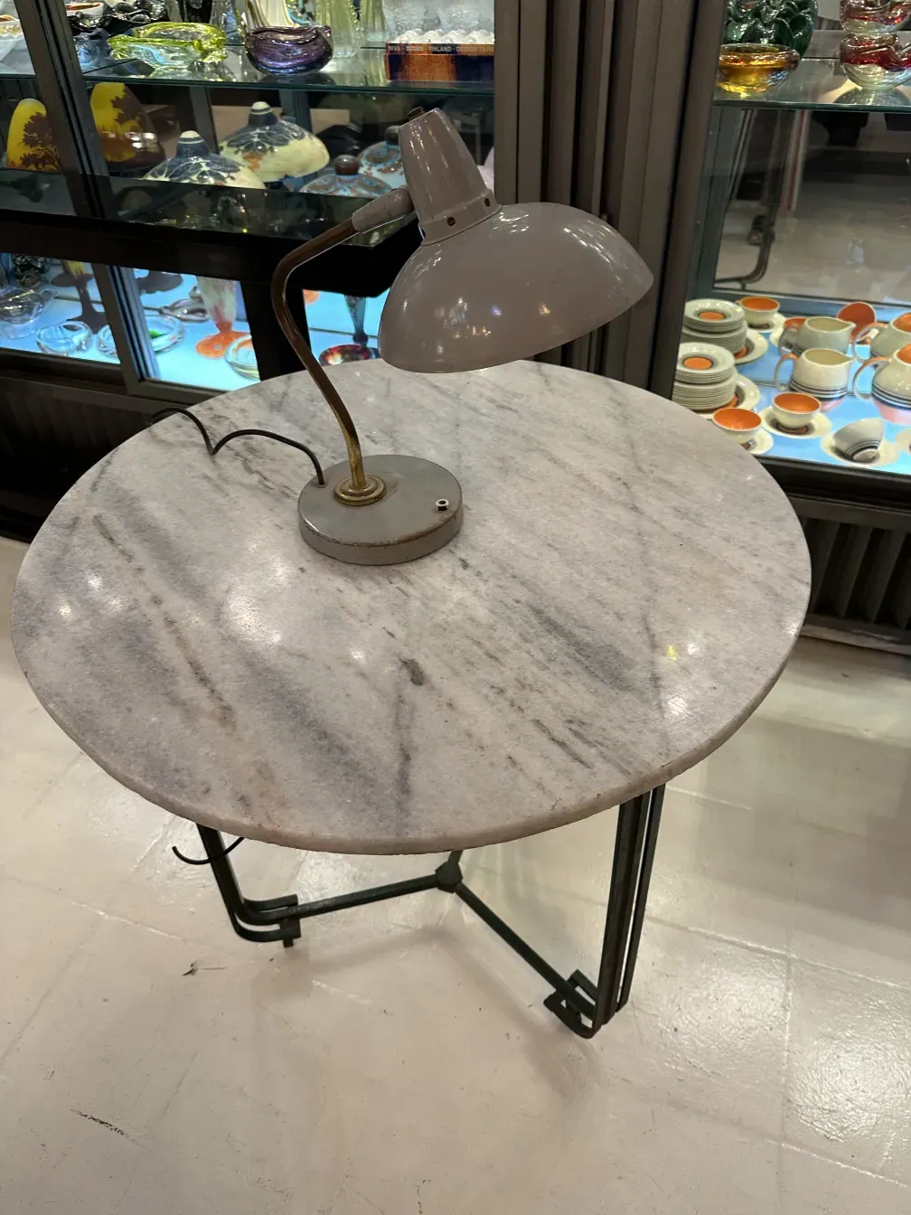 Antique table lamp by Serge Mouille in a stylish setting