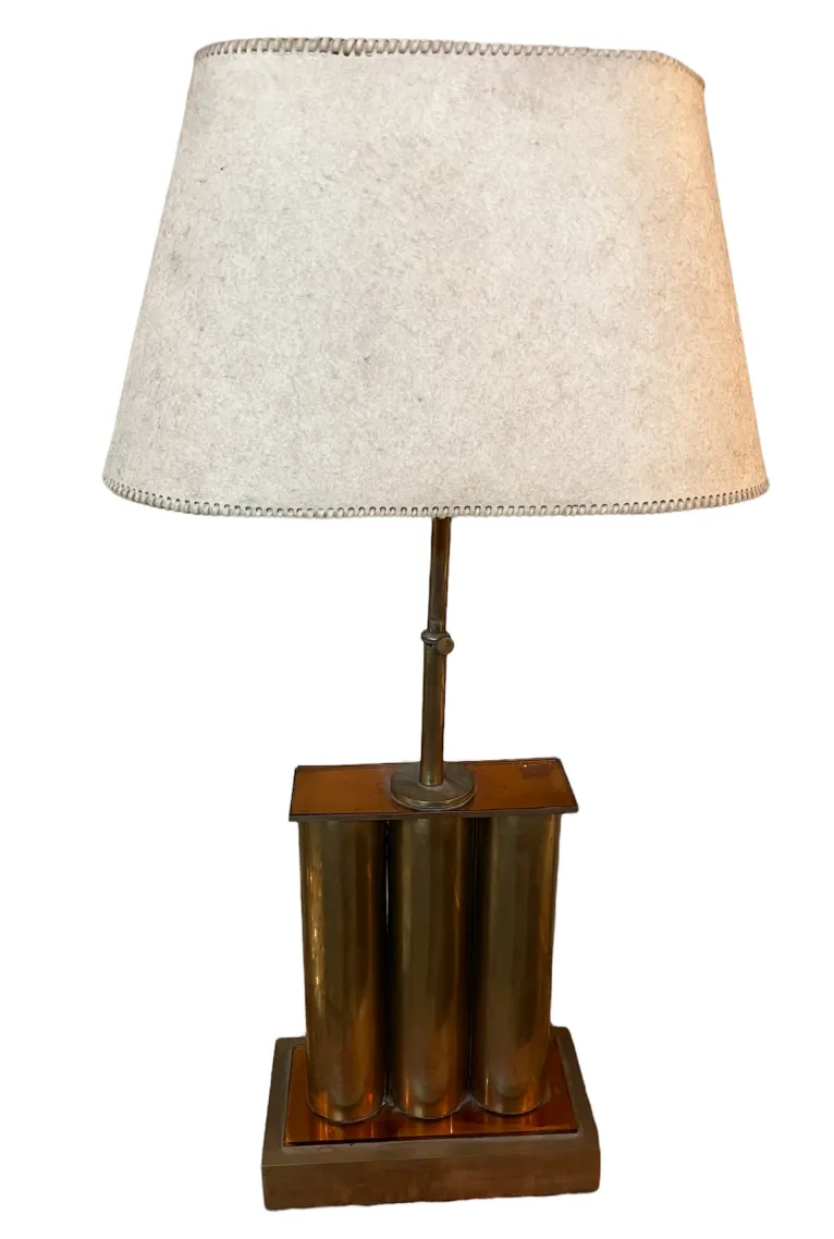 Antique table lamp with a soft shade, well-preserved and stylish, suitable for classic interiors.