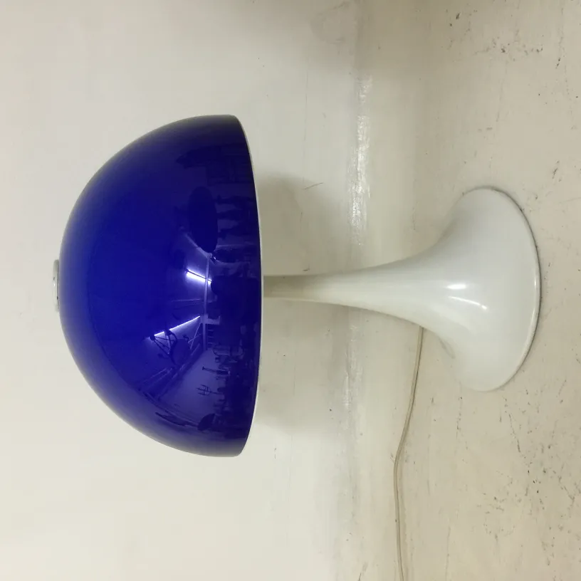 Antique table lamp with blue shade and white base