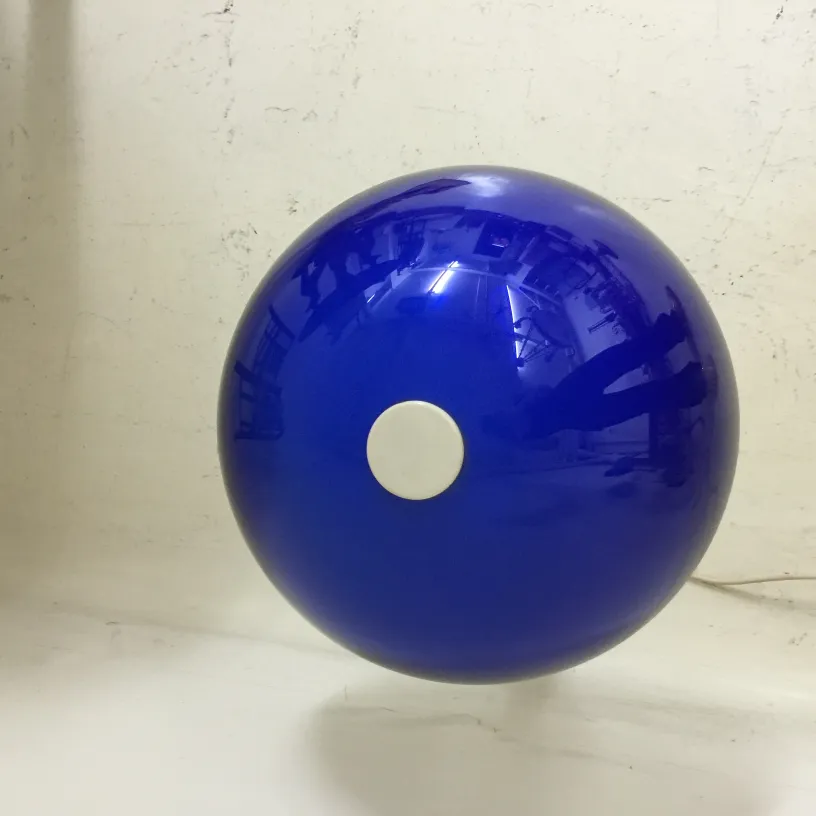 Antique table lamp in blue sphere shape with white base