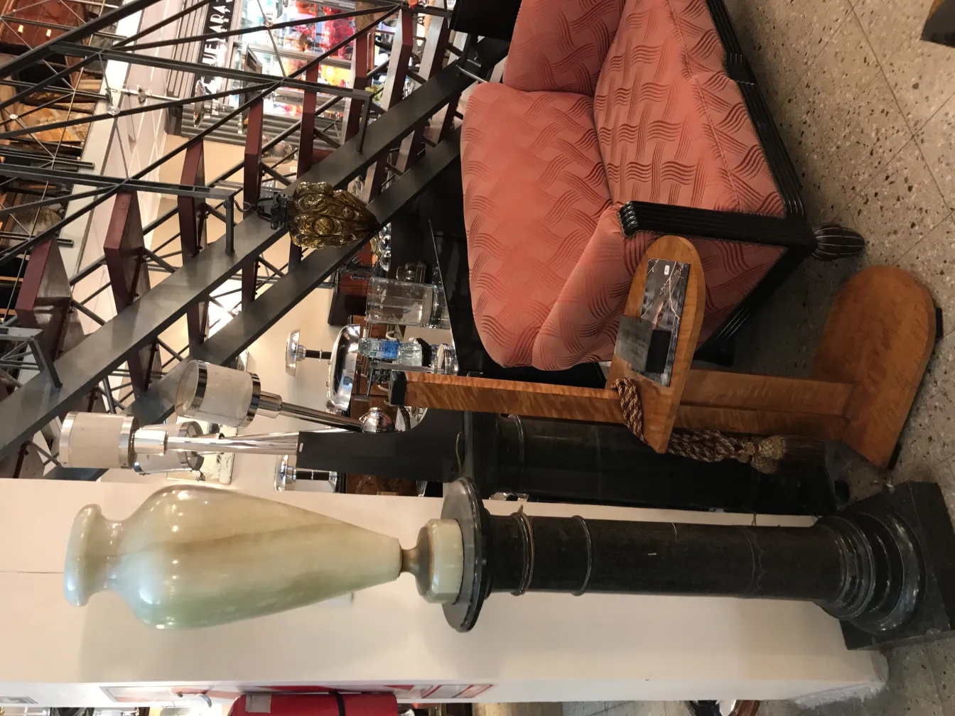 Antique table lamp featuring a distinctive design in a cozy setting