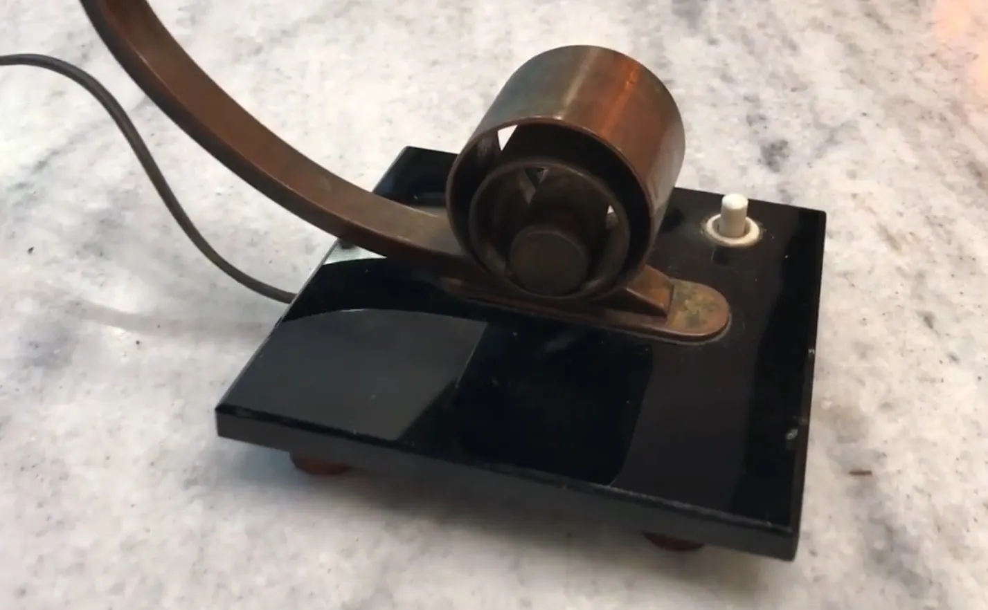 antique table lamp with black base and elegant shape