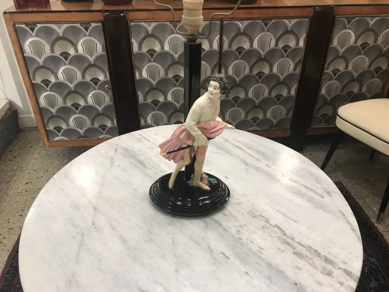 antique table lamp with decorative figure on base