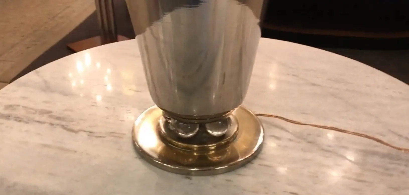 antique table lamp shining on marble table