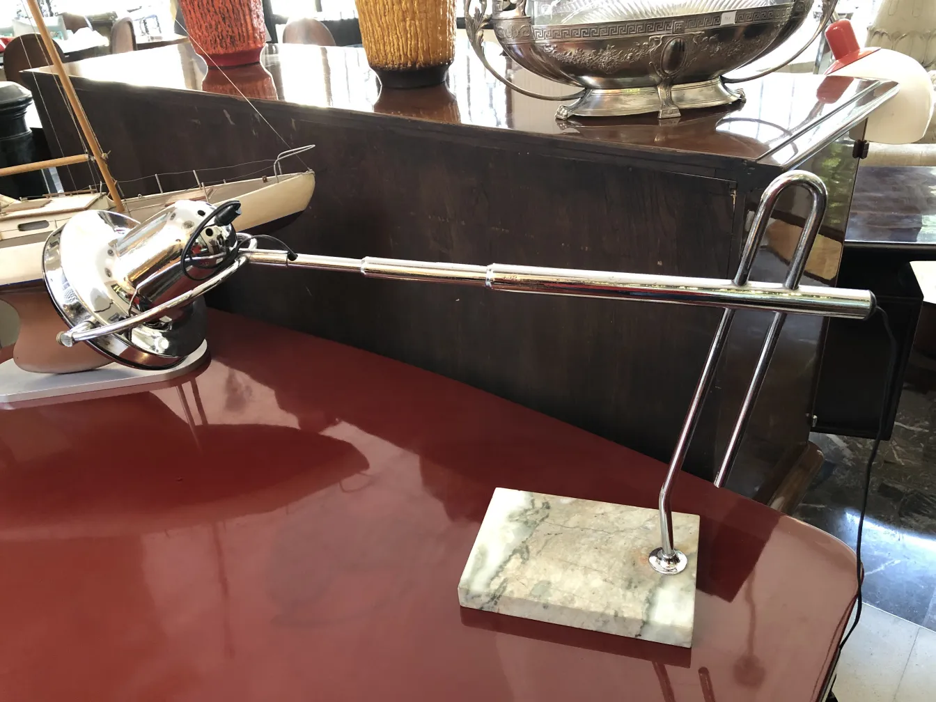 antique table lamp with marble base on a table