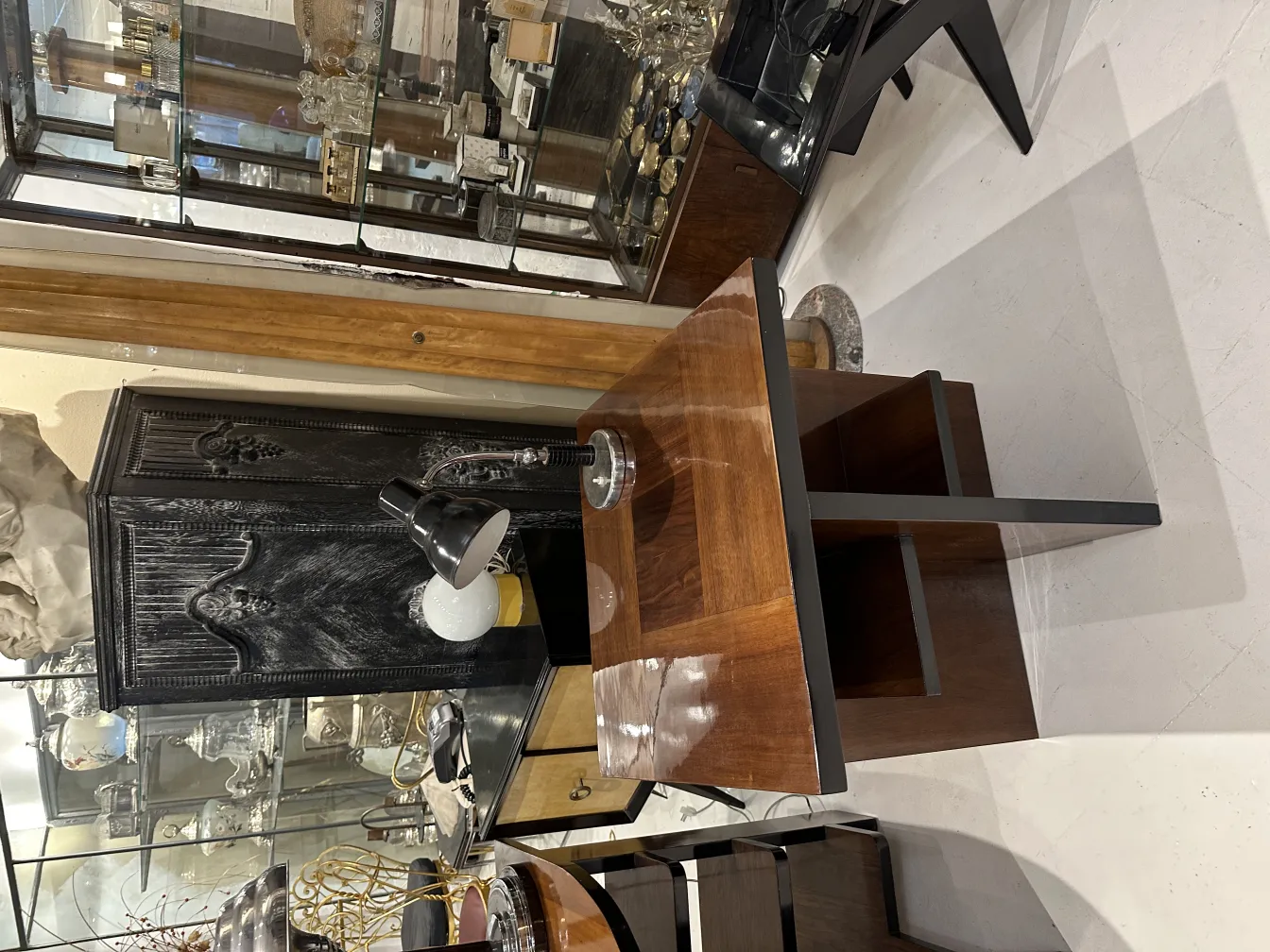 antique table lamp on a table with decorative items