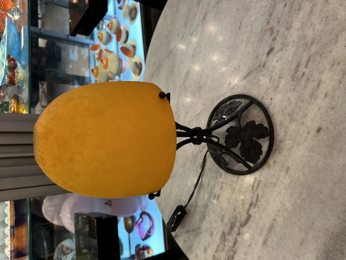 Antique yellow table lamp on marble table