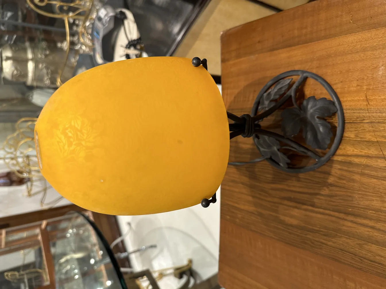 antique table lamp with soft yellow light, cozy setting