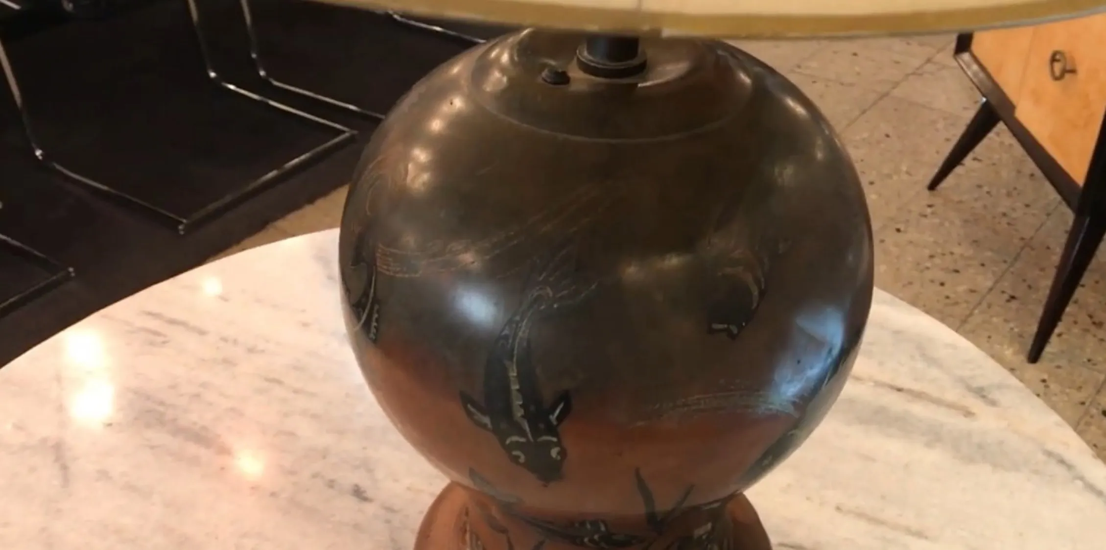 antique WMF table lamp with fish design, elegant setting