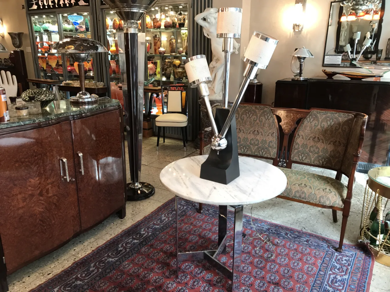 antique table lamp with modern design, three shades, cozy atmosphere