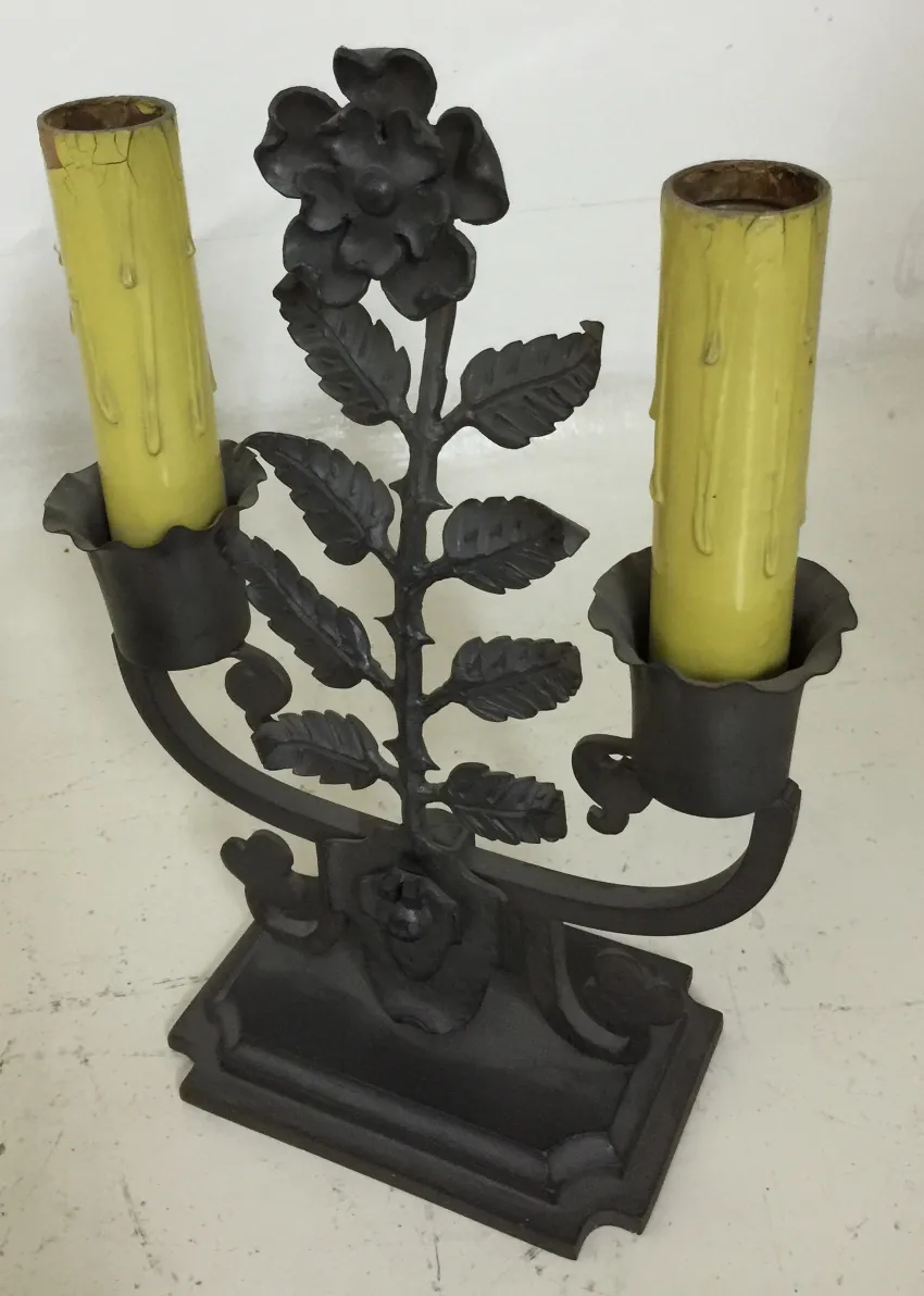 antique table lamp shaped like a flower with yellow candlesticks