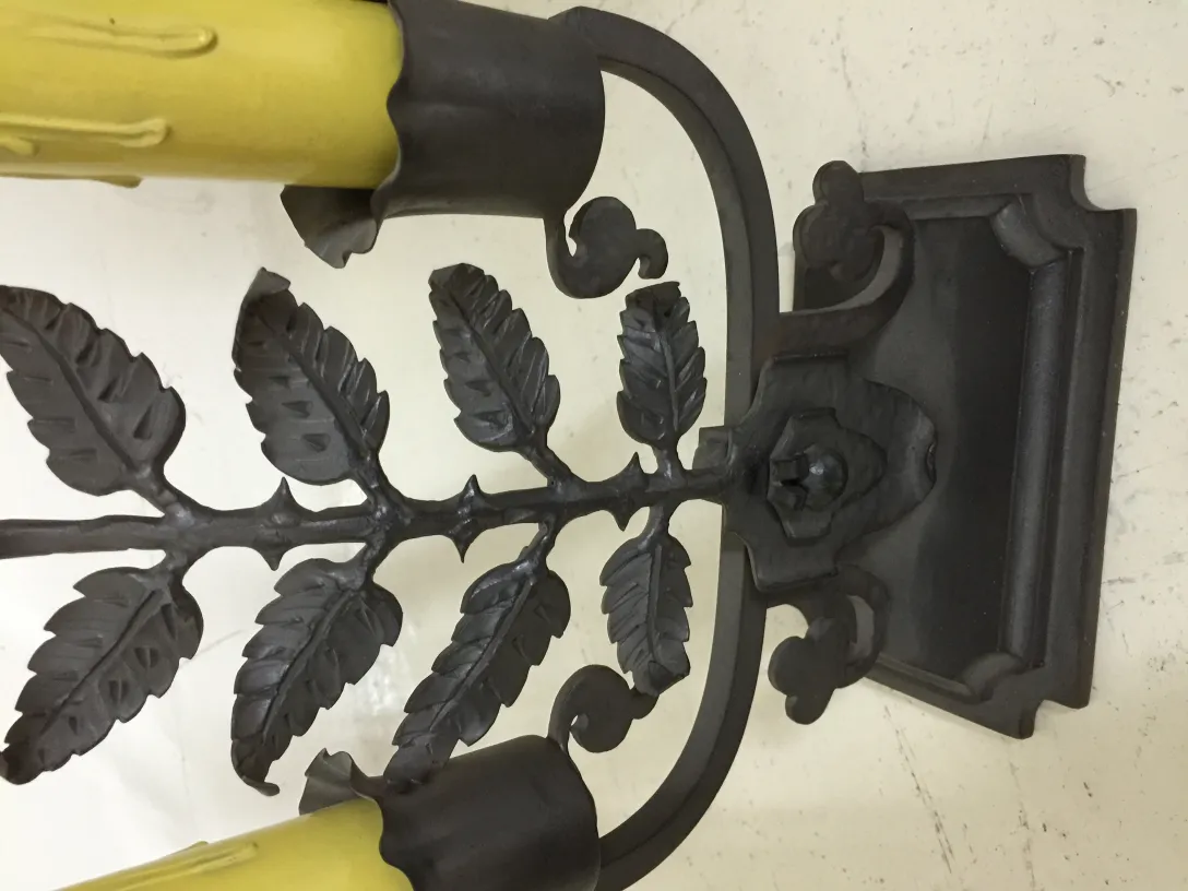 antique table lamp with leaf design and yellow candles, Gilbert Poillerat