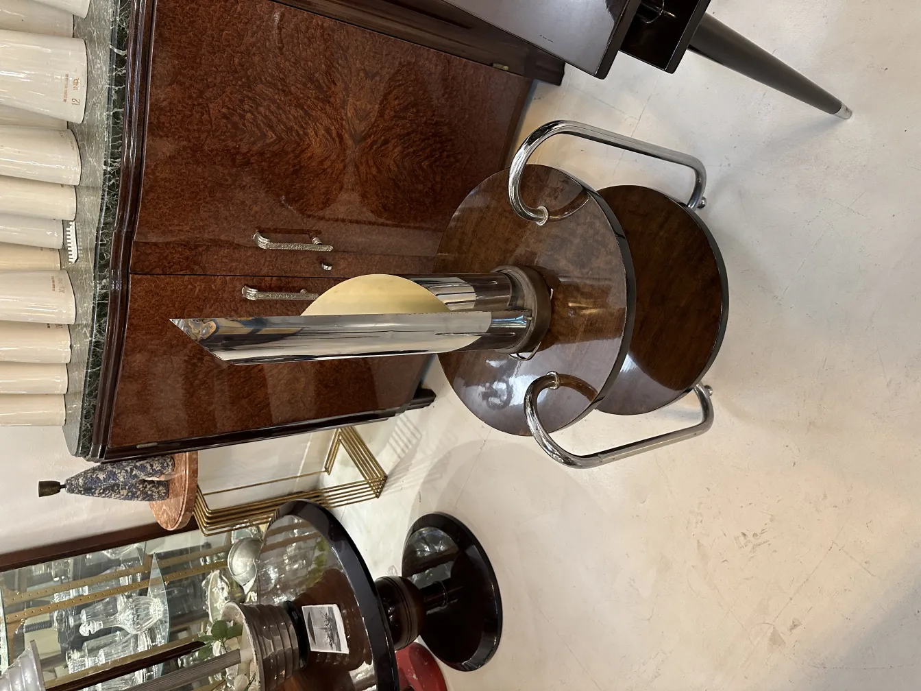 Antique table lamp with a stylish base and unique design details.