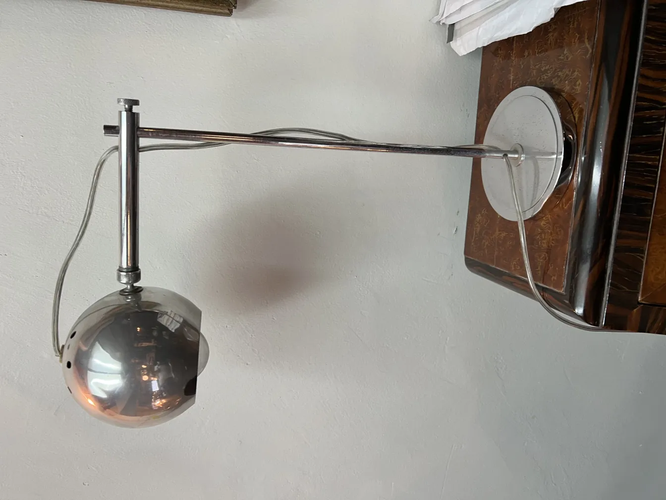 Antique table lamp with modern design and metal base, soft light.