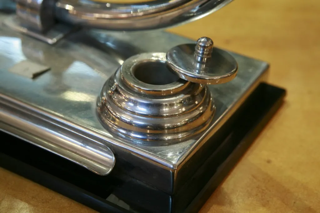 Antique table lamp with a shiny base in a cozy setting