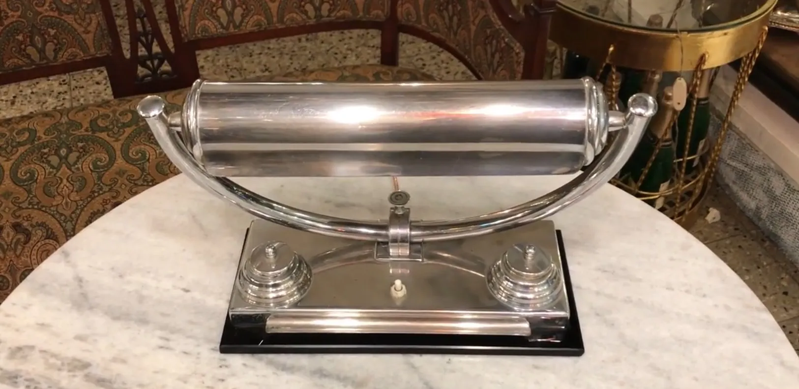 antique table lamp with shiny base and elegant shape in a cozy setting