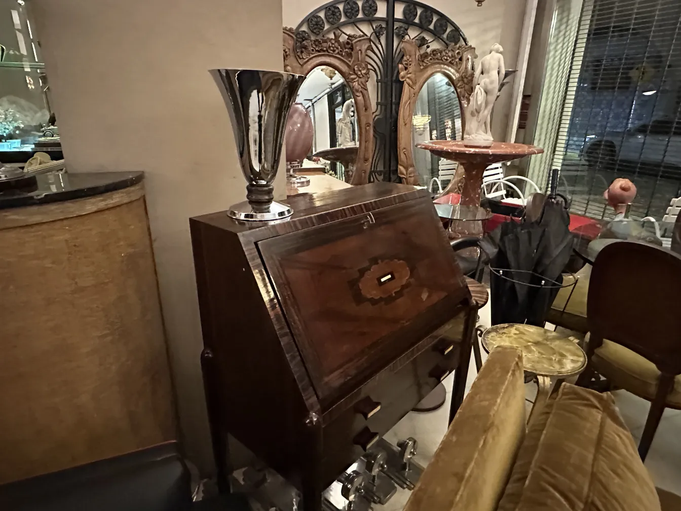 Antique table lamp featuring elegant decorative elements in a stylish setting.