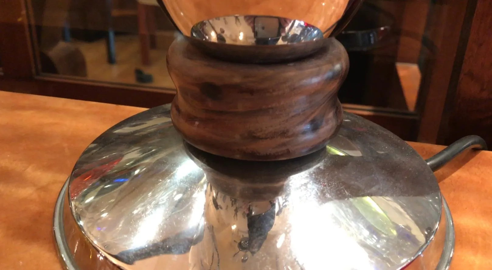 antique table lamp with elegant base and shiny reflections