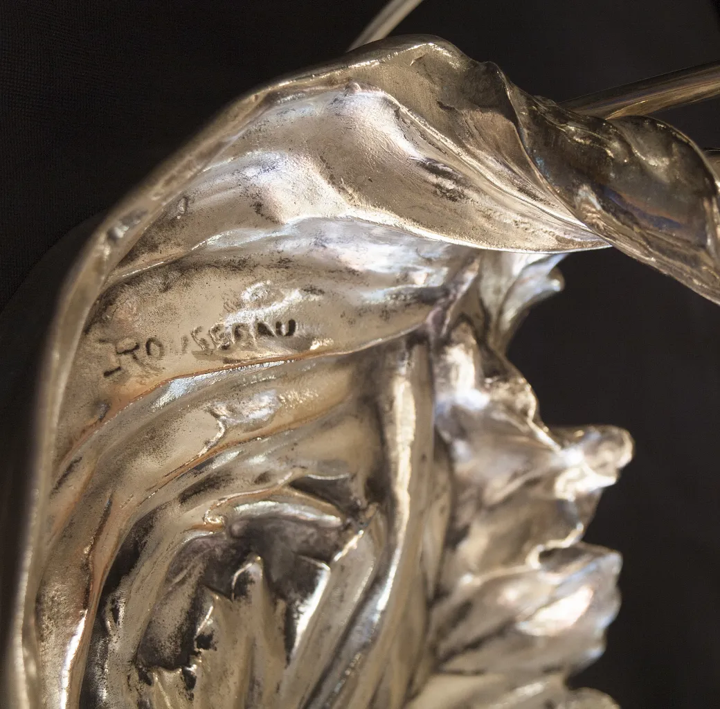 detail of antique table lamp with fresh shapes