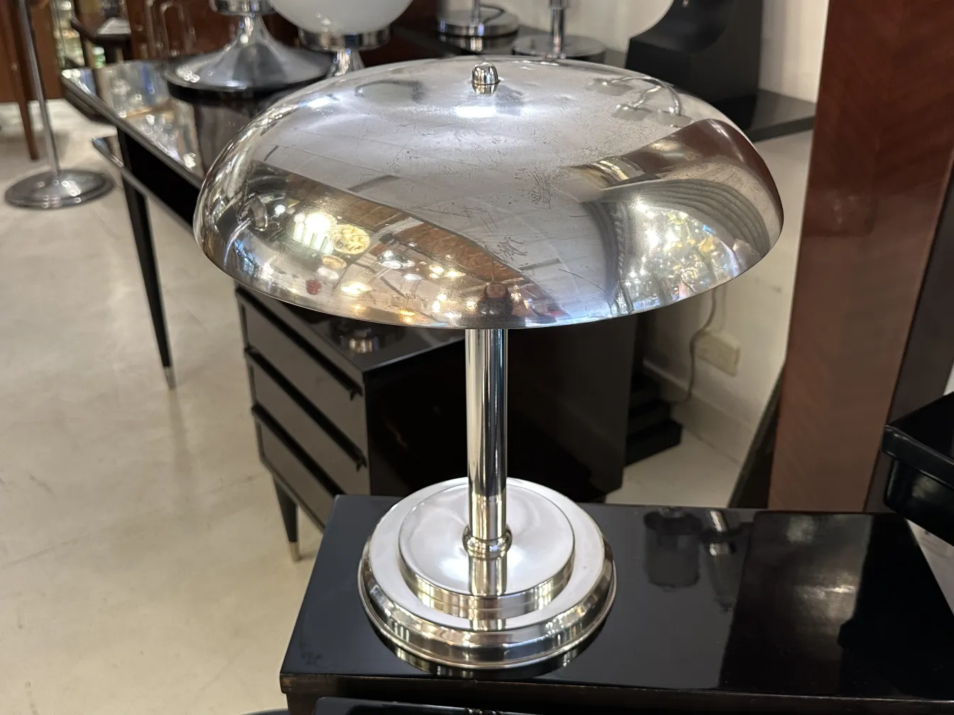 antique shiny table lamp on a wooden table