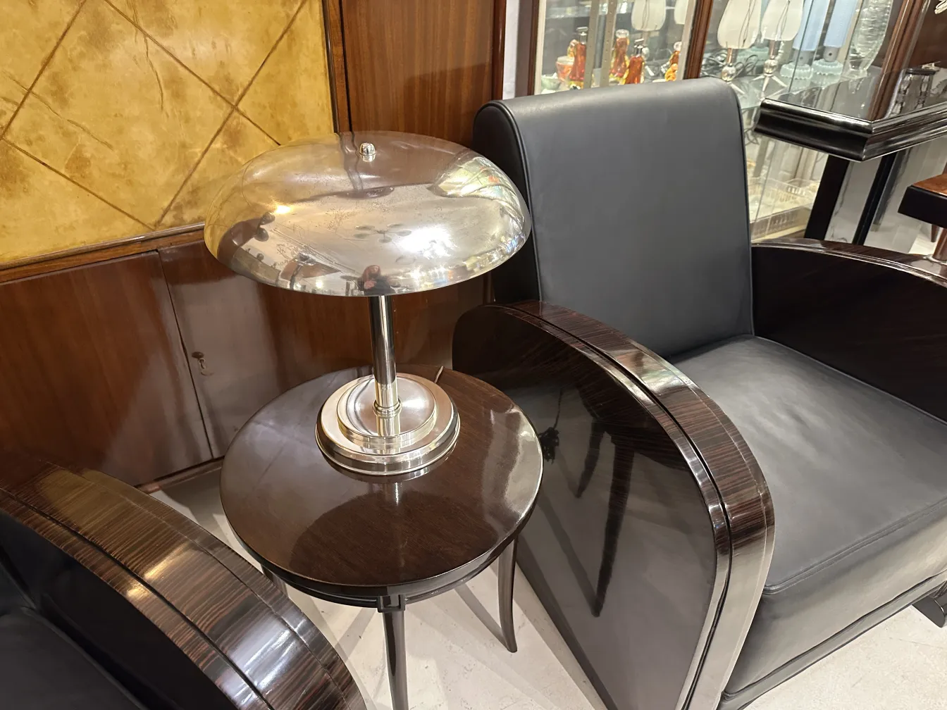 Antique table lamp with round base on coffee table