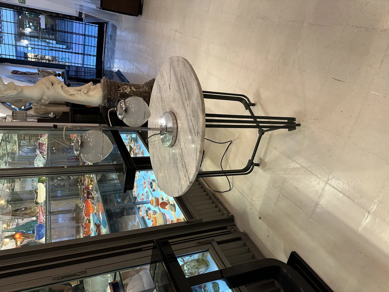 antique table lamp with round shape and double bulbs in an antiques shop